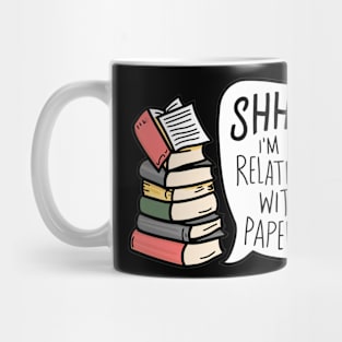 Relationship with a paperback Mug